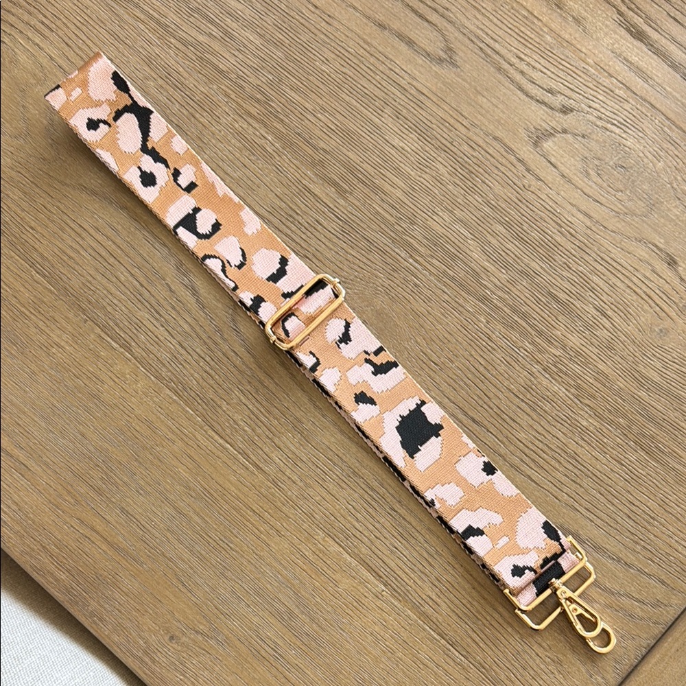 Ahdorned crossbody strap, pink/orange cheetah print with gold hardware
